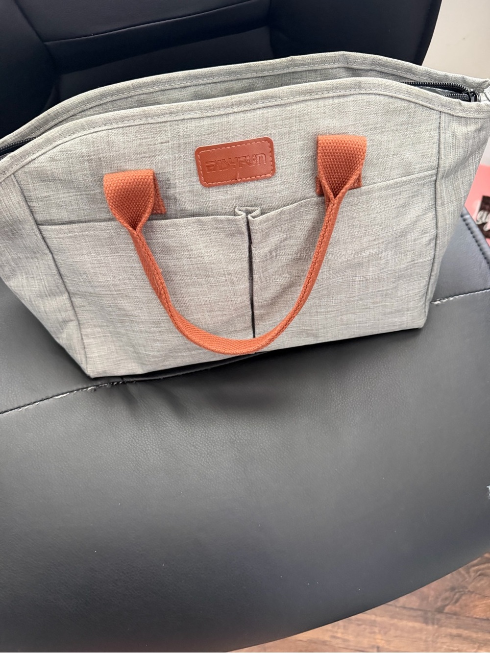 Gray lunch tote with tan Handles